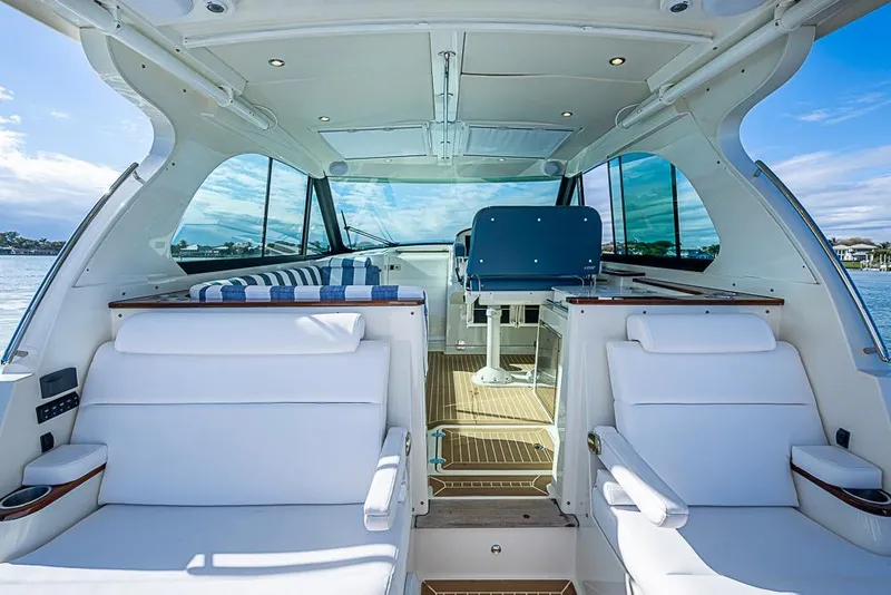 Slide: The Image of Interior of 2023 Hinckley Sport Boat 40 X with luxurious seating and modern design. - 14