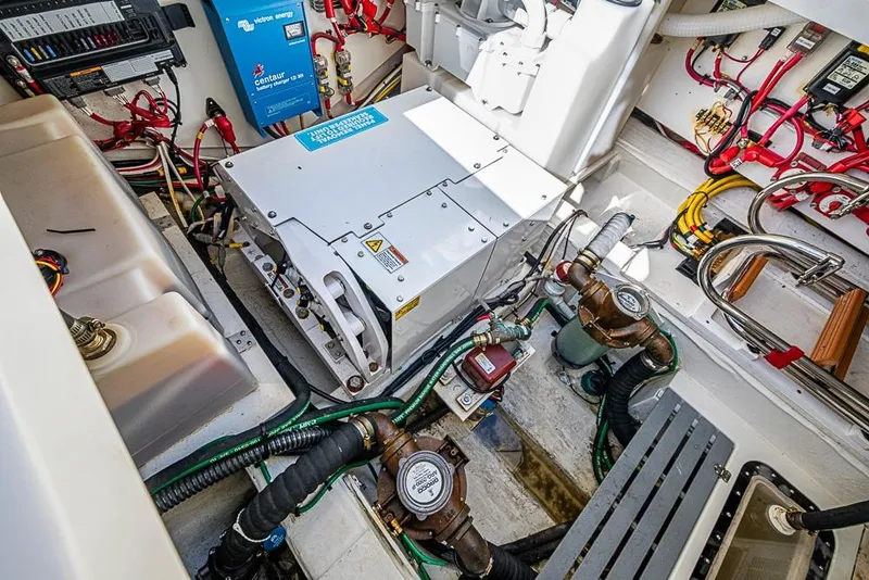 Slide: The Image of Engine room of 2023 Hinckley Sport Boat 40 X, showcasing electrical and mechanical components. - 39