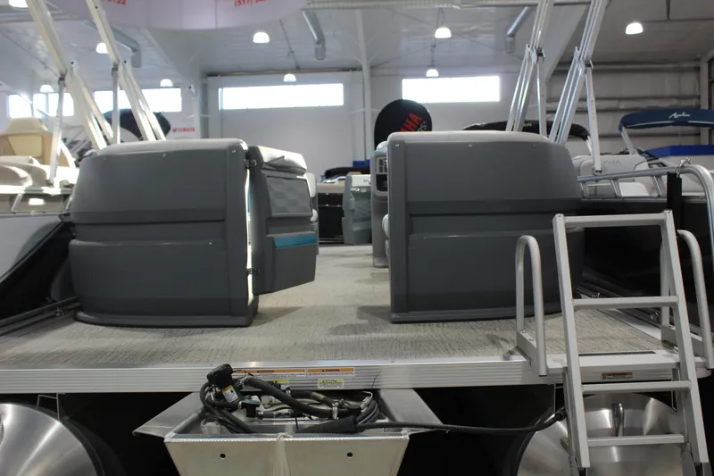 Slide: The Image of 2025 Avalon 2185 25 AURA QL pontoon boat interior in showroom setting. - 8