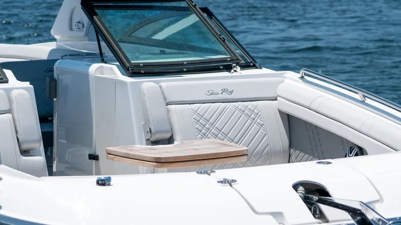 Slide: The Image of 2026 Sea Ray SDX 290 Outboard on water, luxurious interior. - 14