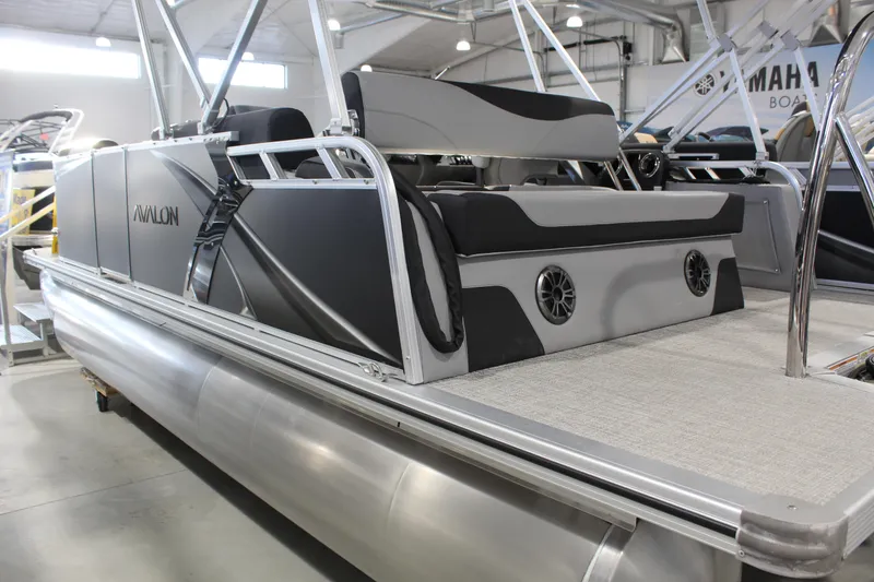 The Image of 2025 Avalon 1985 25 LSZ CRB pontoon boat with sleek design in showroom. - 0