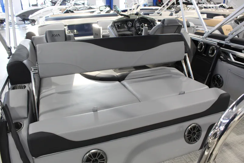 Slide: The Image of 2025 Avalon 1985 25 LSZ CRB boat interior with modern seating and controls. - 11