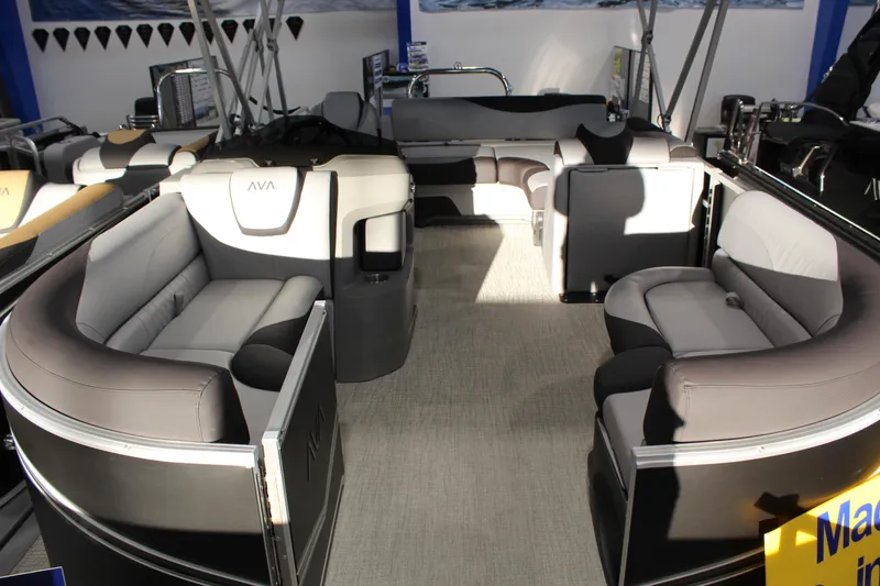 Slide: The Image of Luxurious interior of 2025 Avalon 1985 25 LSZ CRB pontoon boat with plush seating. - 2