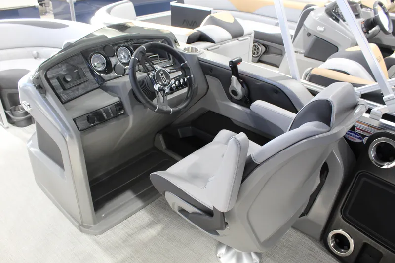 Slide: The Image of 2025 Avalon 1985 25 LSZ CRB boat interior with modern steering console and seating. - 7