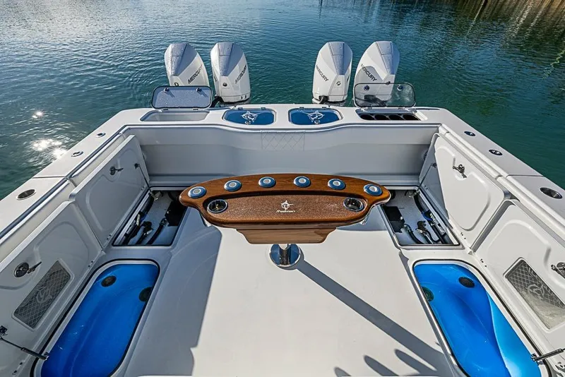 Slide: The Image of 2023 Freeman 47 boat interior with fishing setup and Mercury engines. - 41