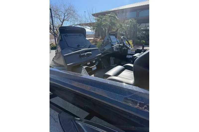 Slide: The Image of 2026 Nitro Z20 XL Pro boat interior with sleek black seating and modern dashboard. - 10