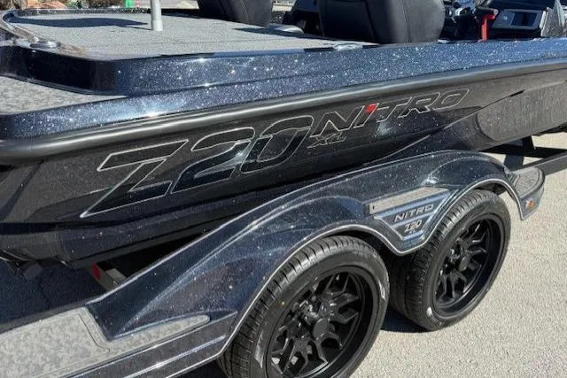 Slide: The Image of 2026 Nitro Z20 XL Pro boat with sleek design and black wheels. - 3