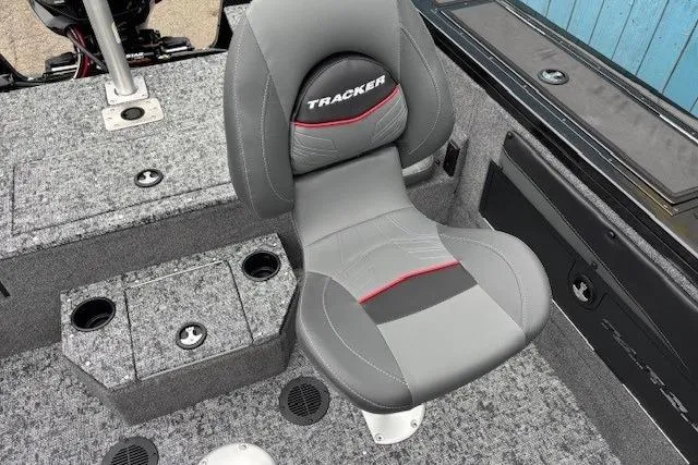 Slide: The Image of 2026 Tracker Targa V-19 Combo boat seat with cup holders and storage compartments. - 22