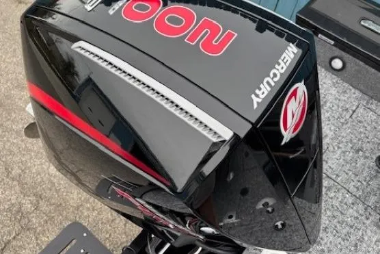 Slide: The Image of Mercury outboard engine on 2026 Tracker Targa V-19 Combo boat, black with red accents. - 29