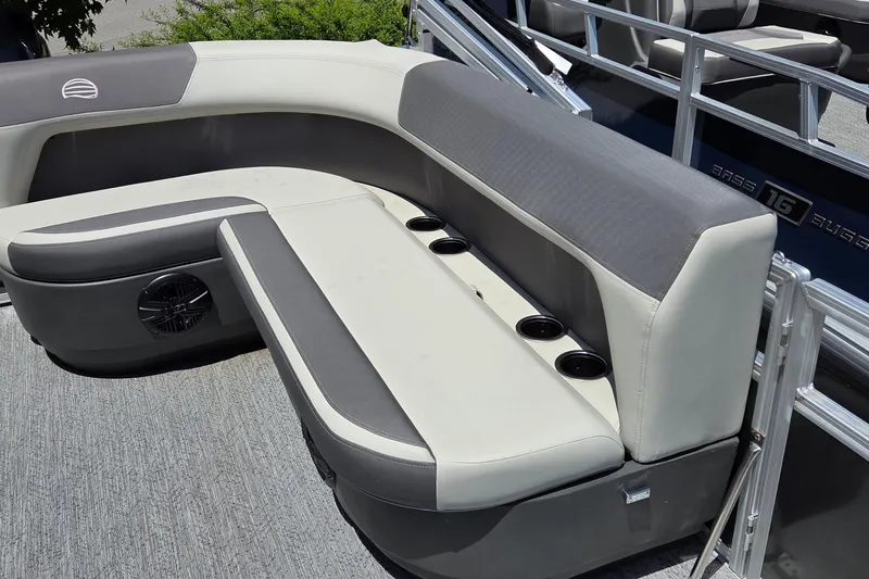 Slide: The Image of 2026 Sun Tracker Bass Buggy 16 XL Select pontoon seating with cup holders. - 3