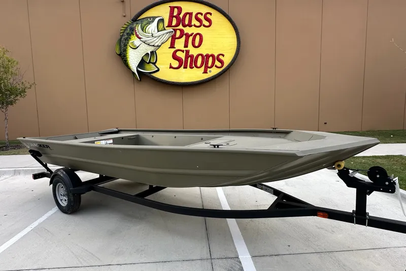 The Image of 2026 Tracker Grizzly 1754 Utility boat on trailer at Bass Pro Shops. - 1