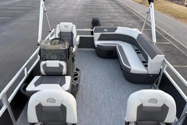 Slide: The Image of 2026 Sun Tracker Bass Buggy 16 XL Select pontoon boat with spacious seating and modern design. - 113