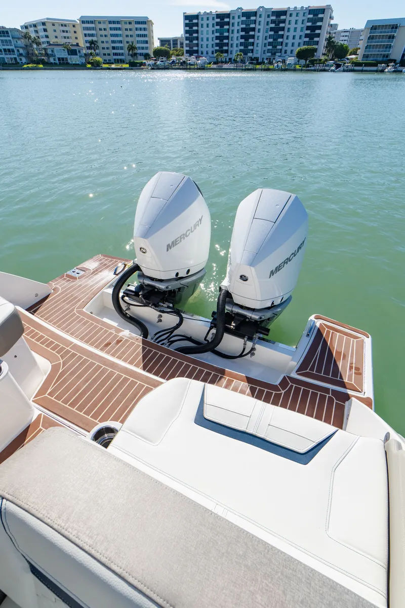 Slide: The Image of 2023 Tiara Yachts 34 LX with Mercury engines on calm water. - 22