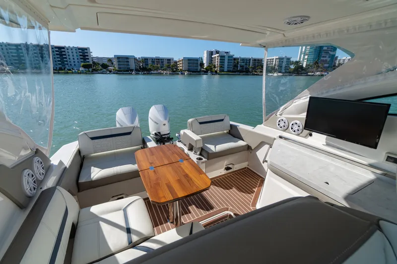 Slide: The Image of Interior of 2023 Tiara Yachts 34 LX with waterfront view. - 29