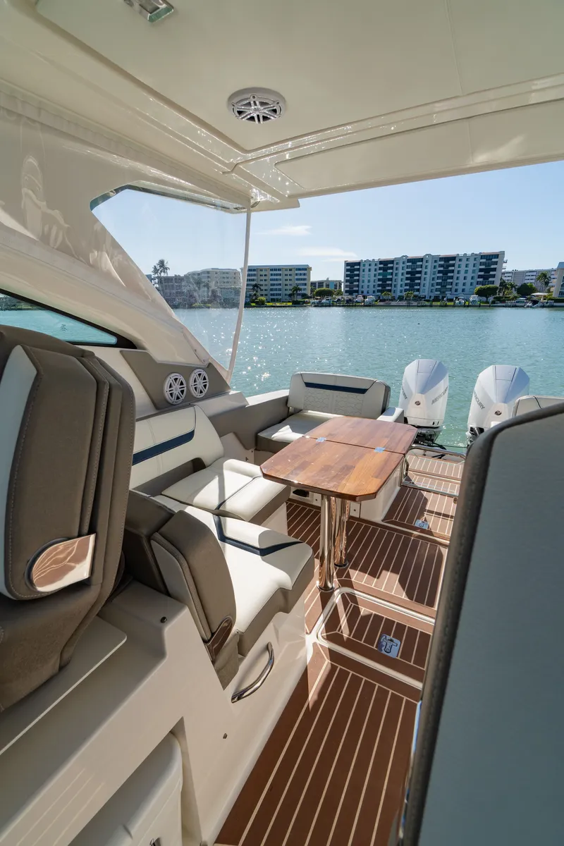 Slide: The Image of Interior of 2023 Tiara Yachts 34 LX with waterfront view. - 30