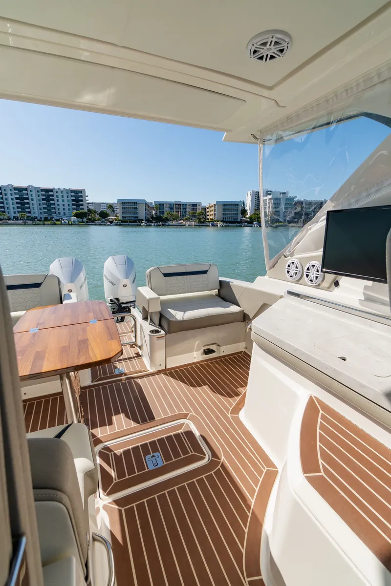 Slide: The Image of Interior of 2023 Tiara Yachts 34 LX overlooking the water. - 31