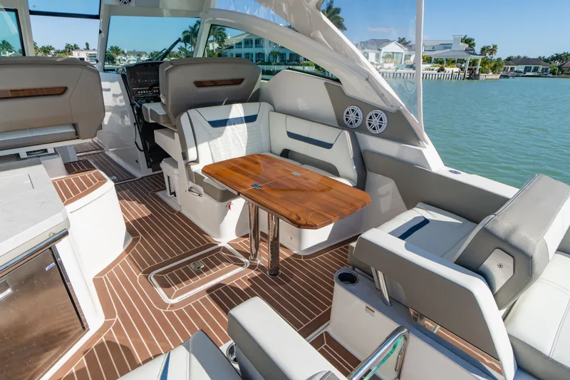 Slide: The Image of Interior of 2023 Tiara Yachts 34 LX with luxurious design. - 35
