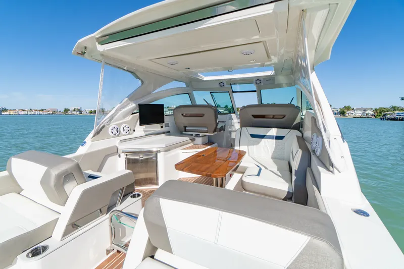 Slide: The Image of Interior of 2023 Tiara Yachts 34 LX on the water. - 36