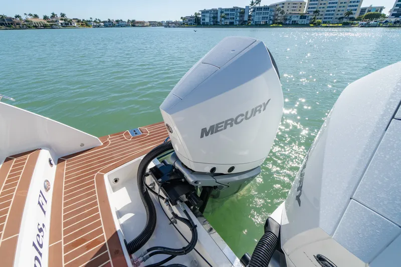 Slide: The Image of 2023 Tiara Yachts 34 LX with Mercury engines on calm water. - 40