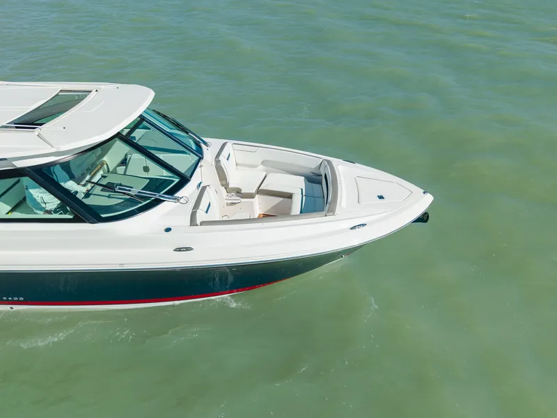 Slide: The Image of 2023 Tiara Yachts 34 LX on calm waters. - 7