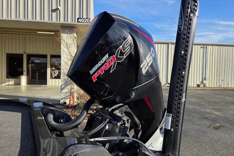 Slide: The Image of 2020 Nitro Z21 boat with Mercury Pro XS 250 engine outside a building. - 3