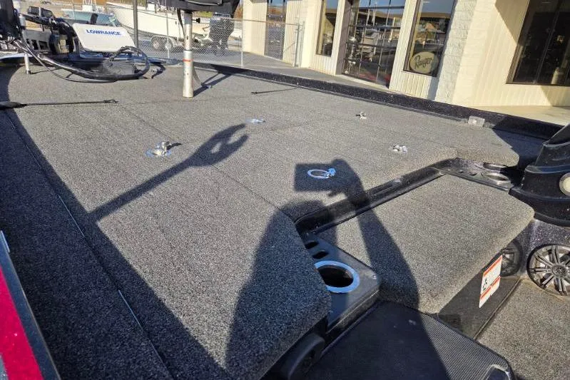 Slide: The Image of 2020 Nitro Z21 boat deck with shadow, featuring Lowrance equipment. - 7