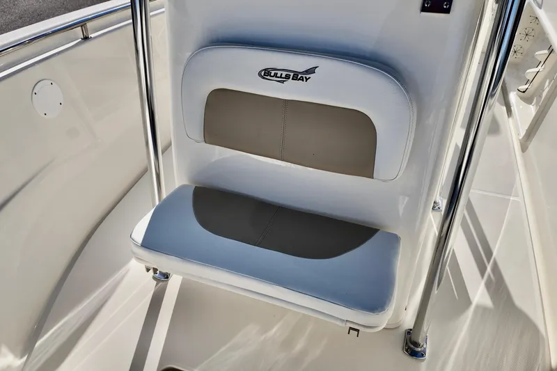 Slide: The Image of 2026 Bulls Bay 230 Center Console boat seat with logo, featuring sleek design and comfortable padding. - 15