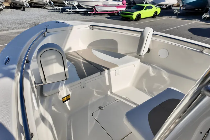 Slide: The Image of 2026 Bulls Bay 230 Center Console boat interior with seating and storage. - 5