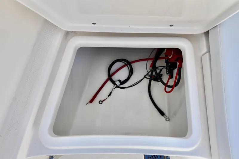 Slide: The Image of Storage compartment with wiring in 2026 Bulls Bay 230 Center Console boat. - 8