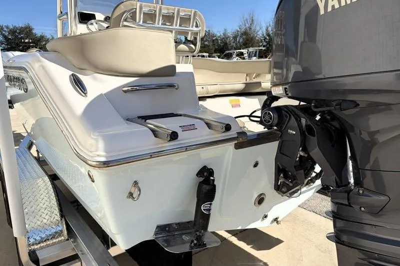 Slide: The Image of 2024 Key West 203 FS boat with Yamaha outboard motor, rear view. - 13