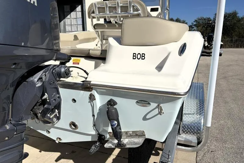 Slide: The Image of 2024 Key West 203 FS boat with Yamaha engine, rear view, on trailer. - 14