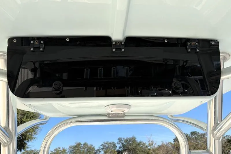 Slide: The Image of 2024 Key West 203 FS boat T-top with black panel and stainless steel frame. - 28