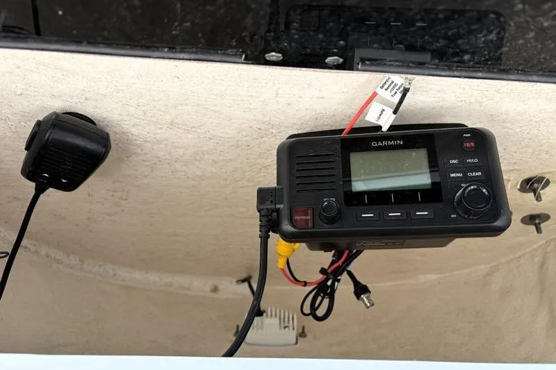 Slide: The Image of Garmin marine radio installed on 2024 Key West 203 FS boat dashboard. - 29