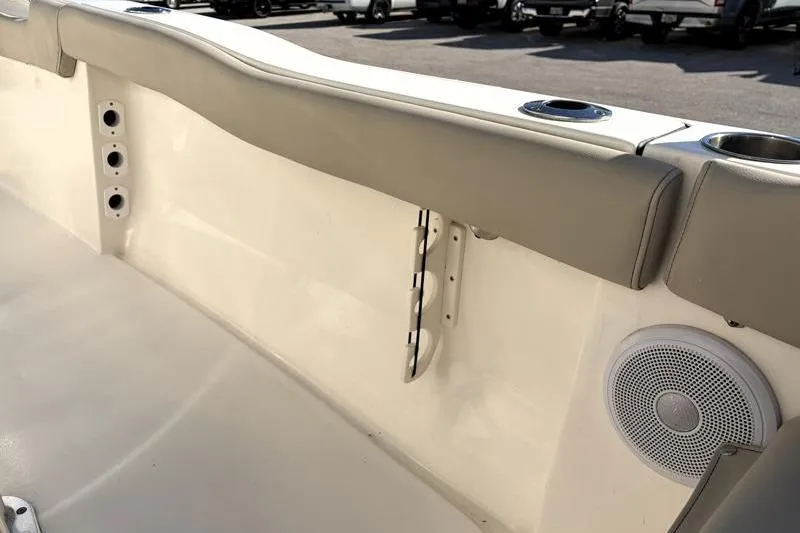 Slide: The Image of 2024 Key West 203 FS boat interior with cup holders and speaker. - 34