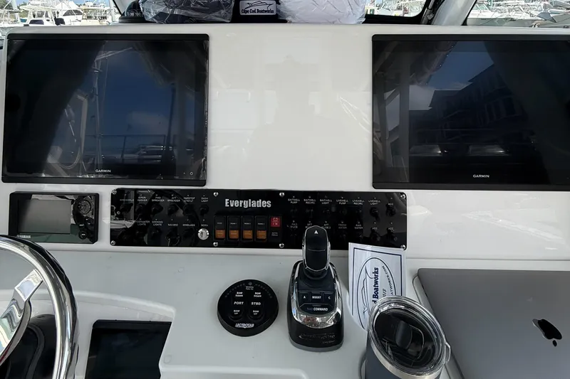 Slide: The Image of Control panel of 2017 Everglades 355 Center Console with dual Garmin displays. - 9