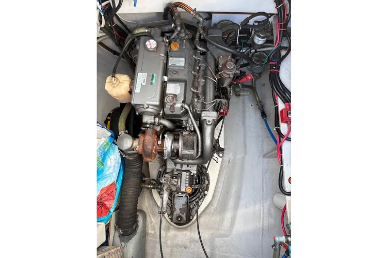 Slide: The Image of Engine compartment of 2015 Fountaine Pajot SABA 50 catamaran, showcasing mechanical components. - 28