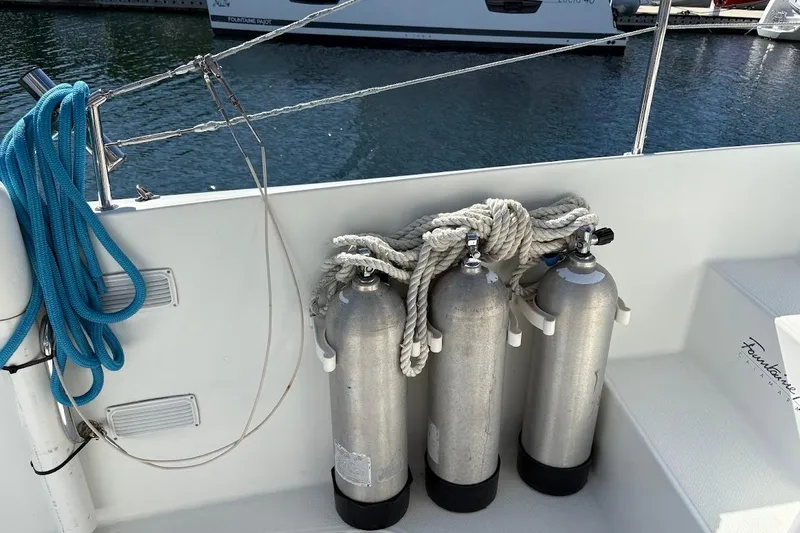 Slide: The Image of Diving tanks and ropes on 2015 Fountaine Pajot SABA 50 catamaran deck. - 30