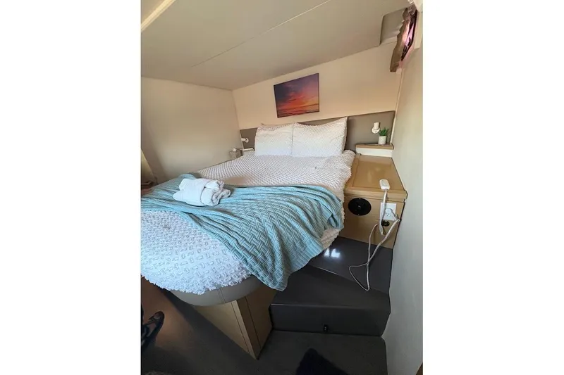 Slide: The Image of Cozy bedroom interior of 2015 Fountaine Pajot SABA 50 yacht with modern decor. - 8