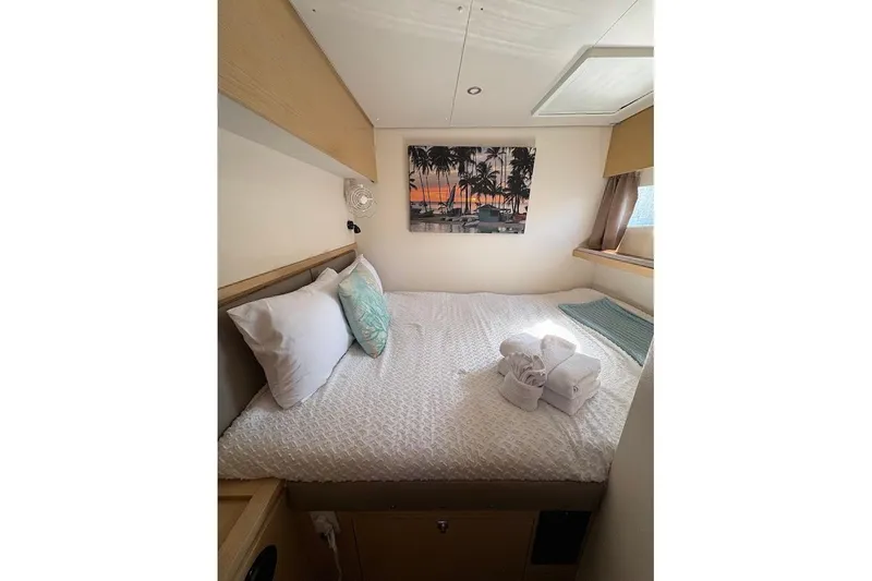 Slide: The Image of Cozy cabin interior of 2015 Fountaine Pajot SABA 50 with bed and tropical decor. - 9