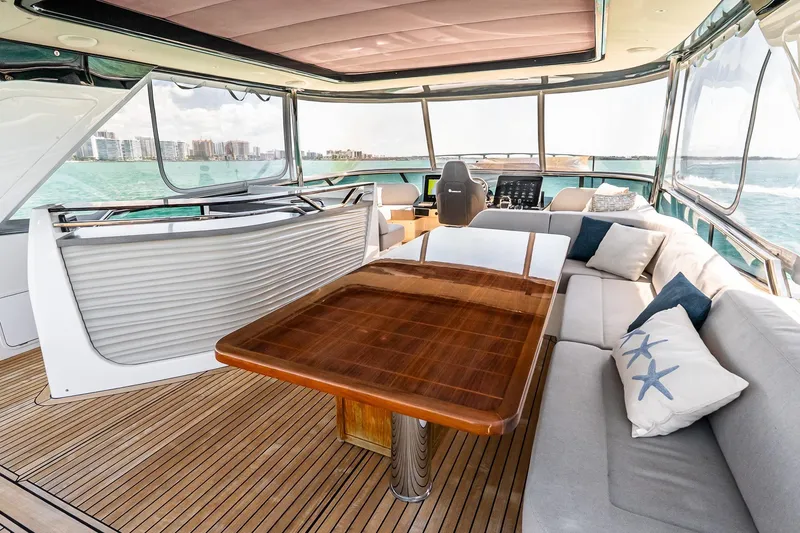 Slide: The Image of Luxurious interior of 2022 Absolute 64 Navetta yacht with elegant seating and ocean view. - 40