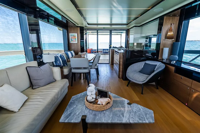 Slide: The Image of Luxurious interior of 2022 Absolute 64 Navetta yacht with modern furnishings and ocean view. - 70