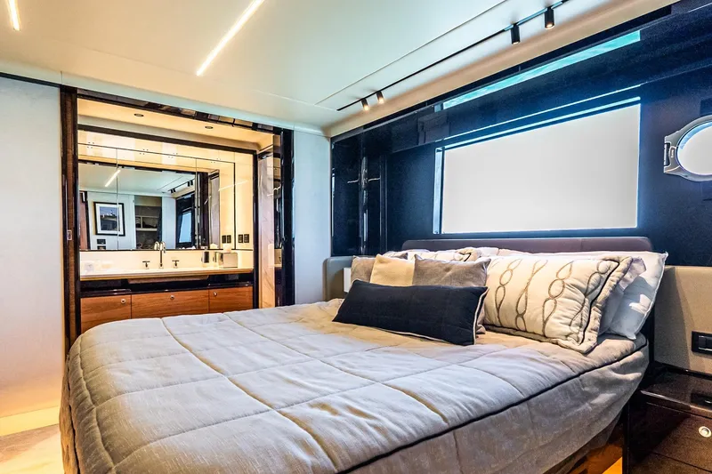 Slide: The Image of Luxurious bedroom interior of 2022 Absolute 64 Navetta yacht with modern design and elegant furnishings. - 91