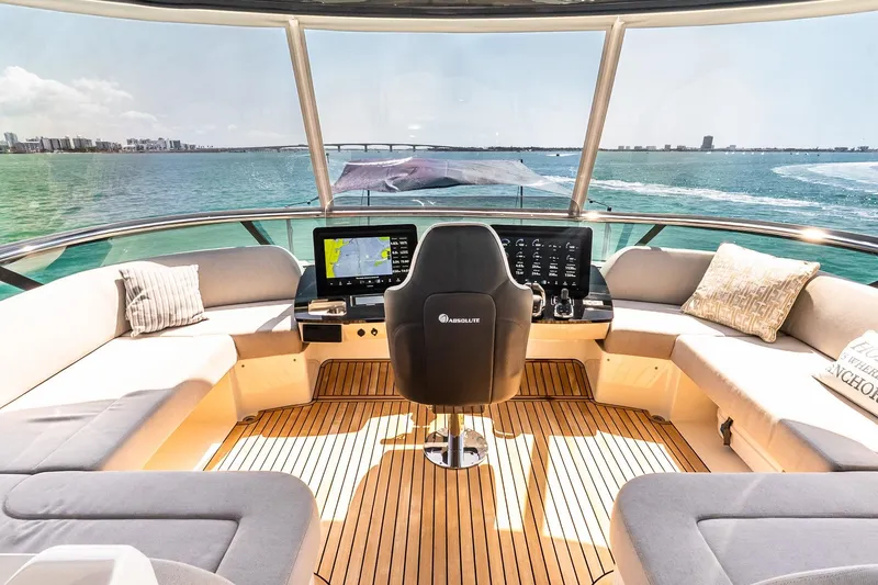 Slide: The Image of Luxurious helm of 2022 Absolute 64 Navetta yacht with panoramic ocean view. - 47
