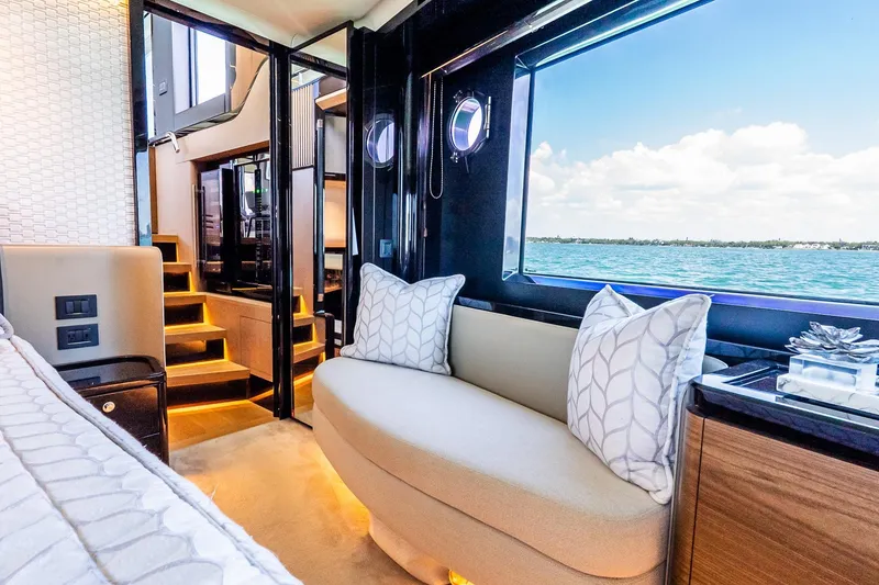 Slide: The Image of Luxurious interior of 2022 Absolute 64 Navetta yacht with scenic ocean view. - 86