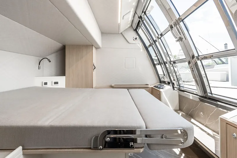 Slide: The Image of Luxurious interior of 2022 Absolute 64 Navetta yacht with modern design and panoramic windows. - 103