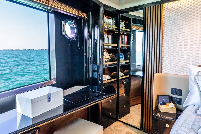 Slide: The Image of Luxurious interior of 2022 Absolute 64 Navetta yacht with ocean view and elegant decor. - 85