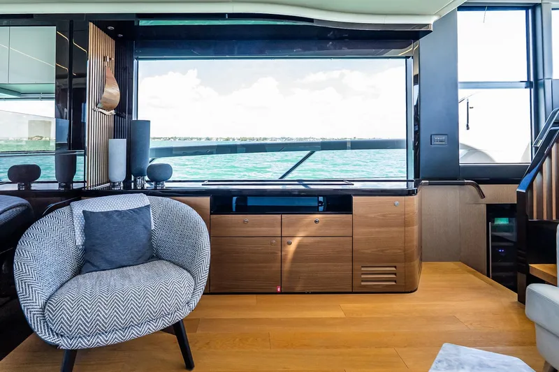 Slide: The Image of Luxurious interior of 2022 Absolute 64 Navetta yacht with modern furnishings and ocean view. - 73