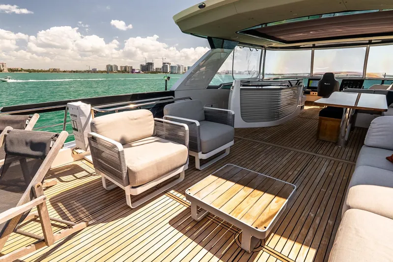 Slide: The Image of Luxurious deck of 2022 Absolute 64 Navetta yacht with modern seating and ocean view. - 36
