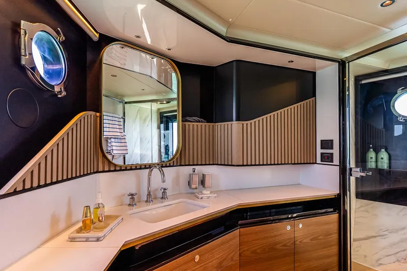 Slide: The Image of Luxurious bathroom interior of 2022 Absolute 64 Navetta yacht with modern fixtures and elegant design. - 87