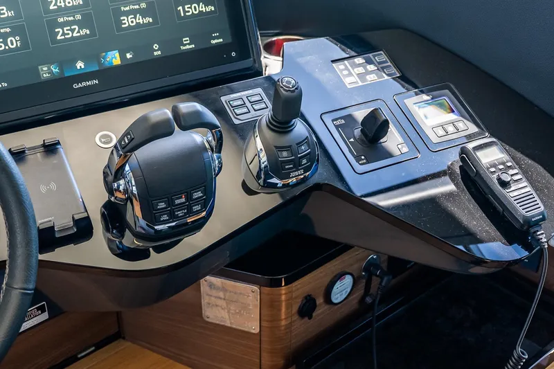 Slide: The Image of Control panel of 2022 Absolute 64 Navetta yacht with Garmin navigation system. - 80